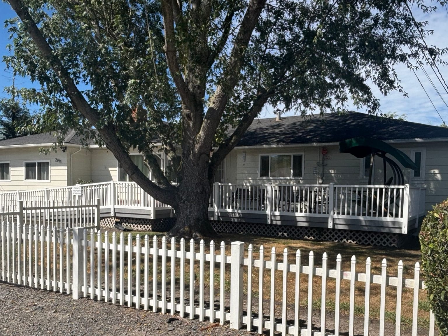 The shaded front deck at Victoria House, one of our six Santa Rosa homes.